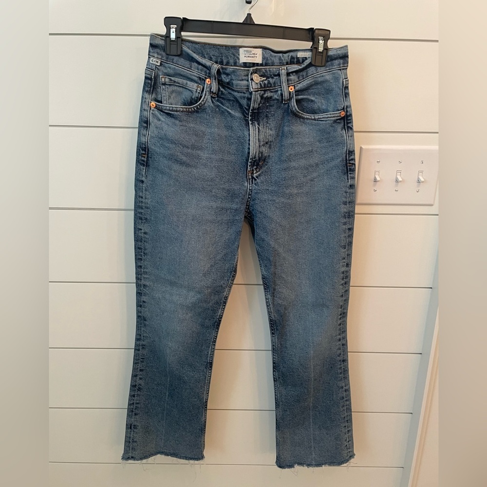 Citizens of Humanity jeans. I’m 5’4 and these sit right above my shoes.